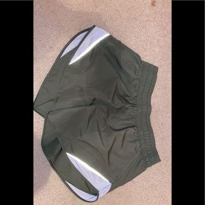 Green athletic shorts